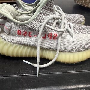 Adidas Gray and White Sneakers with Red Accents